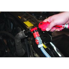 Limpiador del sistema de refrigeración que incluye tope regulador de autoservicio y acoplamiento de presión directa